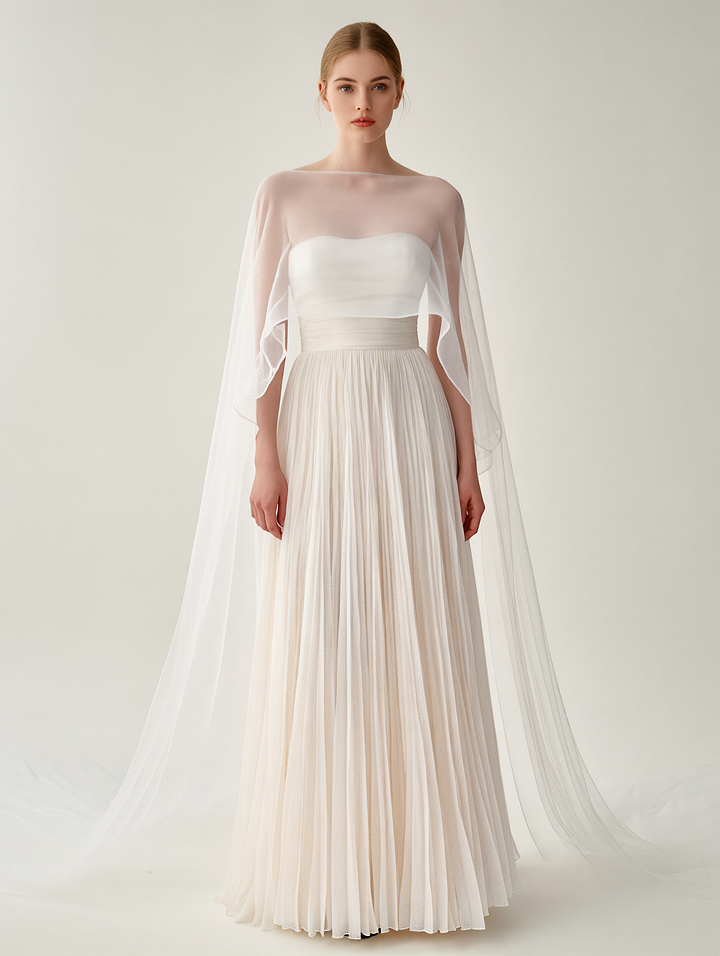 Elegant White Pleated Gown With Sheer Cape Overlay